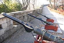 Three large chongtong at the Jinju Fortress museum. The closest is a cheonja-chongtong, the second is a jija-chongtong, and the third is a hyeonja-chongtong. The cannon is equipped with a large arrow, Daejanggunjeon(daejanggunjeon/Da Jiang Jun Jian ). Chongtongs-Jinju Castle.jpg