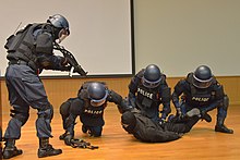 Osaka Prefectural Police Riot Police Unit officers arresting a suspect during training Counter-terrorism training of the Osaka Prefectural Police.jpg