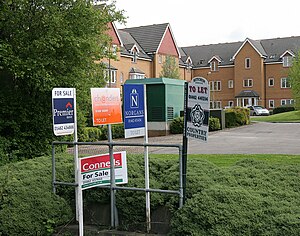 mortgage purchases helping profitlenders homebuyers and property owners looking to refinance British for sale signs.