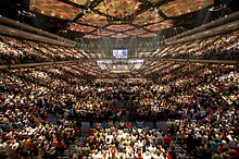 An evangelical charismatic worship service at Lakewood Church, Houston, Texas, in 2013 Lakewood worship.jpg