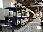 Motorwagen 415 van de Tramways Bruxellois uit 1888 uitgedost als lijn Noordstation – Naamse Poort – Zuidstation.