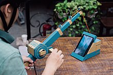 A Nintendo Labo kit simulating a fishing rod and reel Nintendo Labo fishing rod.jpeg