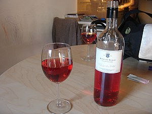 glass & bottle of Syrah rose