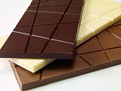 Dark chocolate (top), white chocolate (middle), and milk chocolate (bottom)