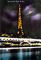 Eiffelturm während der Weltausstellung 1925 mit Leuchtreklame von André Citroën