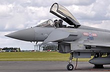 Close-up view of RAF Typhoon F2 ZJ910, showing the deflected canard control surface immediately below the pilot Typhoon f2 zj910 canard arp.jpg