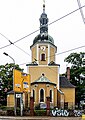 Kirche (mit Ausstattung), Kirchhof mit Einfriedung, Kirchhofstor und Pflasterung, Gedenkstein an der Lutherlinde und Grabsteine