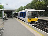 A suburban diesel toward Marylebone along the western platform.