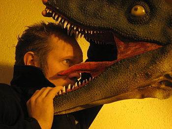 Alexis Dworsky with a model of a Dinosaur (Dei...