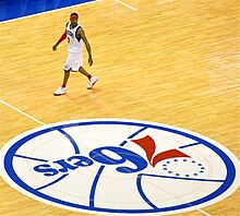 Allen Iverson in 2009, during his second stint in Philadelphia Allen Iverson and the Sixers logo.jpg