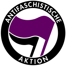 One variant of fantifa symbol, displaying an anarcha-feminist purple flag symbolic of the female gender instead of the traditional socialist red flag of Antifaschistische Aktion. Anarcho-feminist antifa.svg