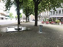 Brunnen aus Bronze und Stein von Trudi Demut am Werdplatz aus dem Jahr 1982