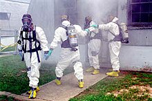 Drug Enforcement Administration (DEA) agents wearing Level B hazmat suits Hazmat DEA.jpg