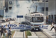 The first operating segment of Los Angeles Metro Rail opened on July 14, 1990, then-known as the Blue Line. LA Blue Line Opening Celebration.jpg