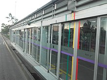 A TransMilenio bus rapid transit station in Bogota with platform screen doors Parada Ferias tm Bogota N.jpg