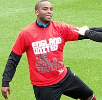 South African striker Benni McCarthy, warming up for a charity match