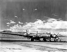 The length of the 141-foot (43 m) wing span of a Boeing B-29 Superfortress based at Davis-Monthan Field is vividly illustrated here with the cloud-topped Santa Catalina Mountains as a contrasting background. Boeing B-29 Superfortress at Davis-Monthan AFB.jpg