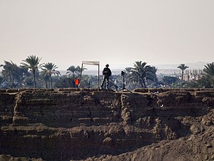 Egyptian military forces guard post at the bri...