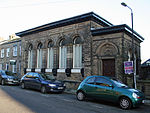 Nos 34 and 36 (former bank building and attached boundary wall)