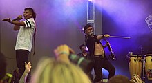 Педро Эразо и Сергей Рябцев из Gogol Bordello на Lollapalooza 2015 в Чикаго