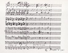 Ukázka Händelova rukopisu, originální ruční partitury, 4 takty a deset notových linek pod sebou