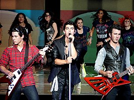 The Jonas Brothers performing in 2010 (from left to right: Nick, Joe, Kevin)