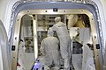 KSC-loading of Dragon-with workers.jpg