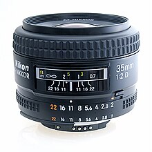 A 35 mm lens set to
f/11, as indicated by the white dot above the f-stop scale on the aperture ring. This lens has an aperture range of
f/2 to
f/22. Lens aperture side.jpg