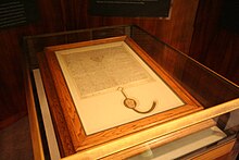 A 1297 copy of Magna Carta, owned by the Australian Government and on display in the Members' Hall of Parliament House, Canberra Magna Carta (1297 version, Parliament House, Canberra, Australia) - 20080416.jpg