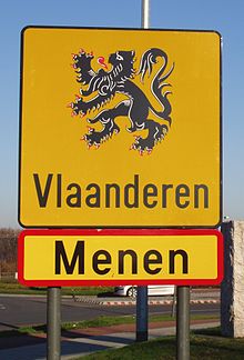 The official flag used on a border sign in Menen Menen - Border crossing 1 cropped.jpg