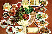Bossam table with banchan (side dishes)