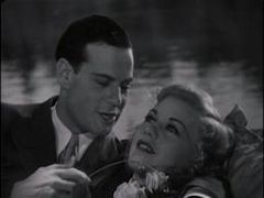 With Norman Foster in Rafter Romance (1933)