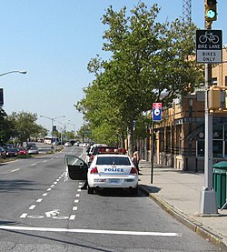 Class II Bike lane in the door zone. This is common in New York City. Richmond Terrace door zone jeh.JPG