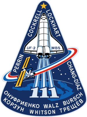 300px-Sts-111-patch.png