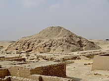 Mound remains of a pyramid and the preserved remains of a temple