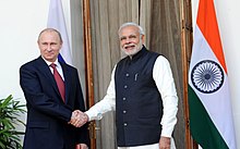 Putin with Indian prime minister Modi in New Delhi Vladimir Putin and Narendra Modi greet each other at the 15th Annual India-Russia Summit.jpg