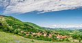 Панорамски поглед на селото Шлегово и Приковци во далечината на планината Плавица