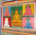 A mural at Shahpur representing the Bade Baba pratima with parikar in the old temple (center)