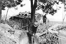 RAD members digging a trench for a RAD flak battery in March 1945 Bundesarchiv Bild 183-H28335, RAD-Flak, Ausheben eines Schutzengrabens.jpg