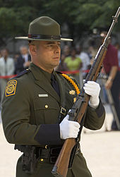 A Border Patrol Honor Guard Agent carrying an M14 rifle. CBP M14.jpg