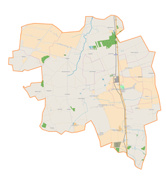 Mapa konturowa gminy Daszyna, blisko prawej krawiędzi znajduje się punkt z opisem „Janice”