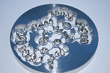 Chrome-cobalt disc with crowns for dental implants, manufactured using WorkNC CAM Disc with dental implants made with WorkNC.jpg