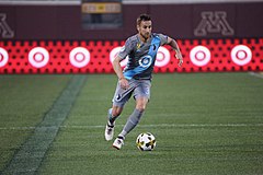 Minnesota United FC player with Target's logo on the jersey and on the stadium's advertisement boards Jerome Theisson PHI vs MIN 2017-09-09 (36975333956).jpg
