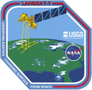 Нашивка Landsat-7 Mission Patch.png