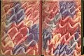 Multi-colored paste paper with impressed designs used as book endpapers, 18th century