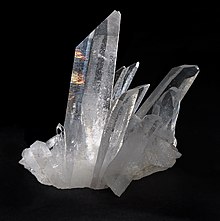 Quartz is one of the several crystalline forms of silica, SiO2. The most important forms of silica include: a-quartz, b-quartz, tridymite, cristobalite, coesite, and stishovite. Quartz, Tibet.jpg