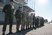 Military personnel from participating countries in the "Rapid Trident-2014" exercise assembling in front of the command post of the training center, on September 19, 2014.