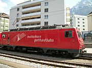 Swiss Electric Locomotive at Brig, Switzerland, note the Alps at top right corner