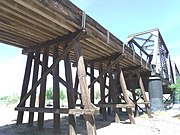 The wooden trestles of the 1912 Southern Pacific Bridge over Tempe Lake.