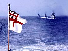 The White Ensign flying from a Royal Navy vessel. 48 NATO fleet entering Stavanger Norway April 1975.jpg